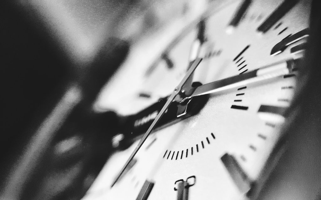 grayscale photography of clock